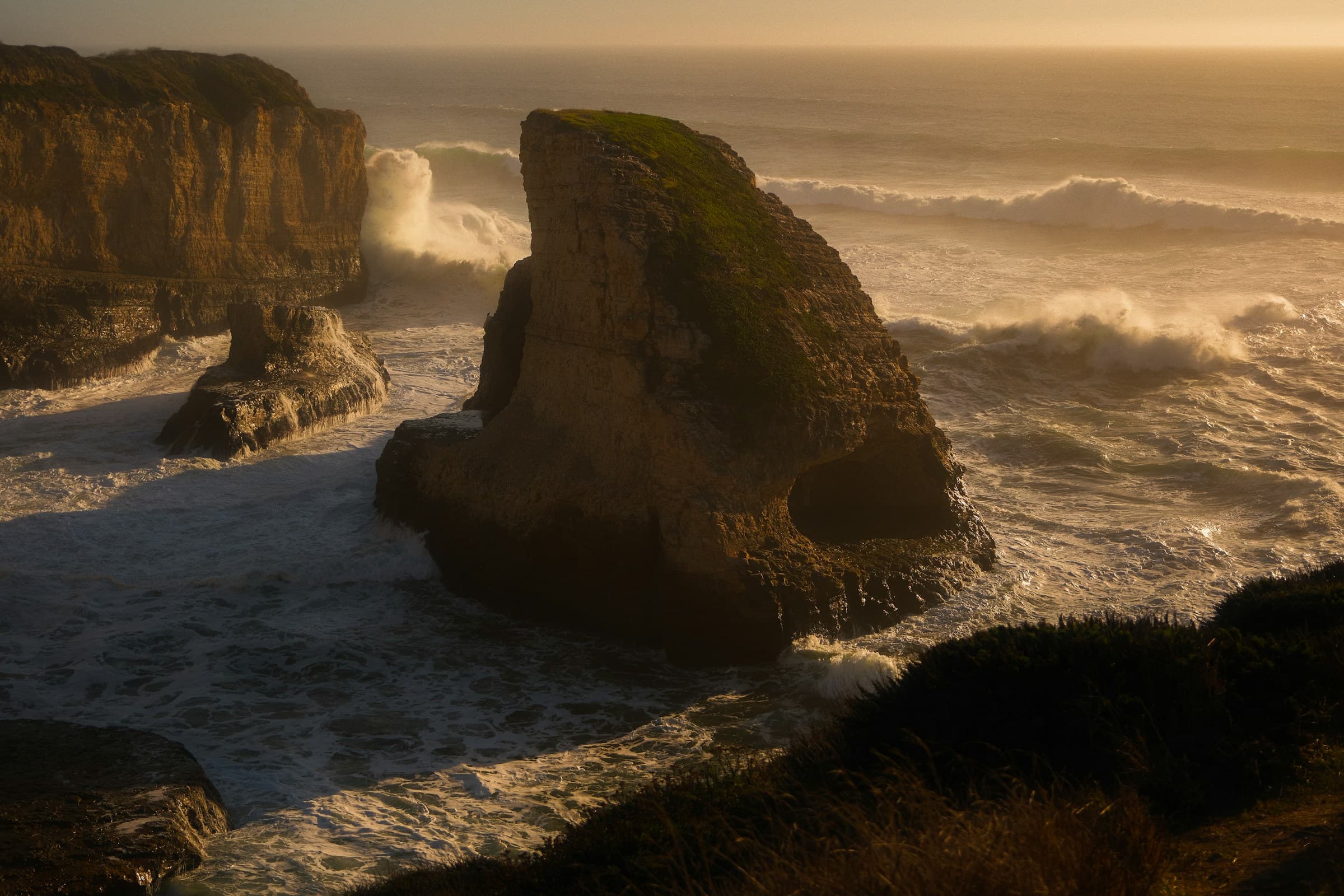 Rocky seaside landscape with dramatic lighting